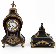 A gilt metal mounted ebonised case mantle clock