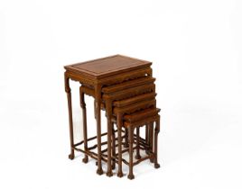 A nest of four Chinese carved hardwood tables