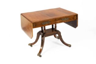 A Regency rosewood and brass inlaid sofa table