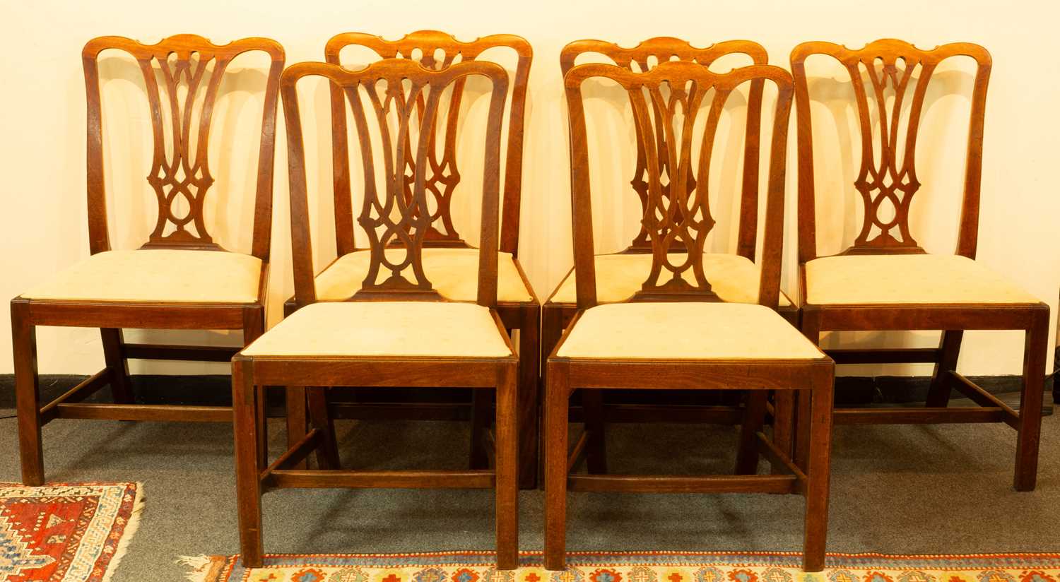 A set of six George III mahogany dining chairs