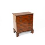 A George III mahogany chest of drawers of small proportions