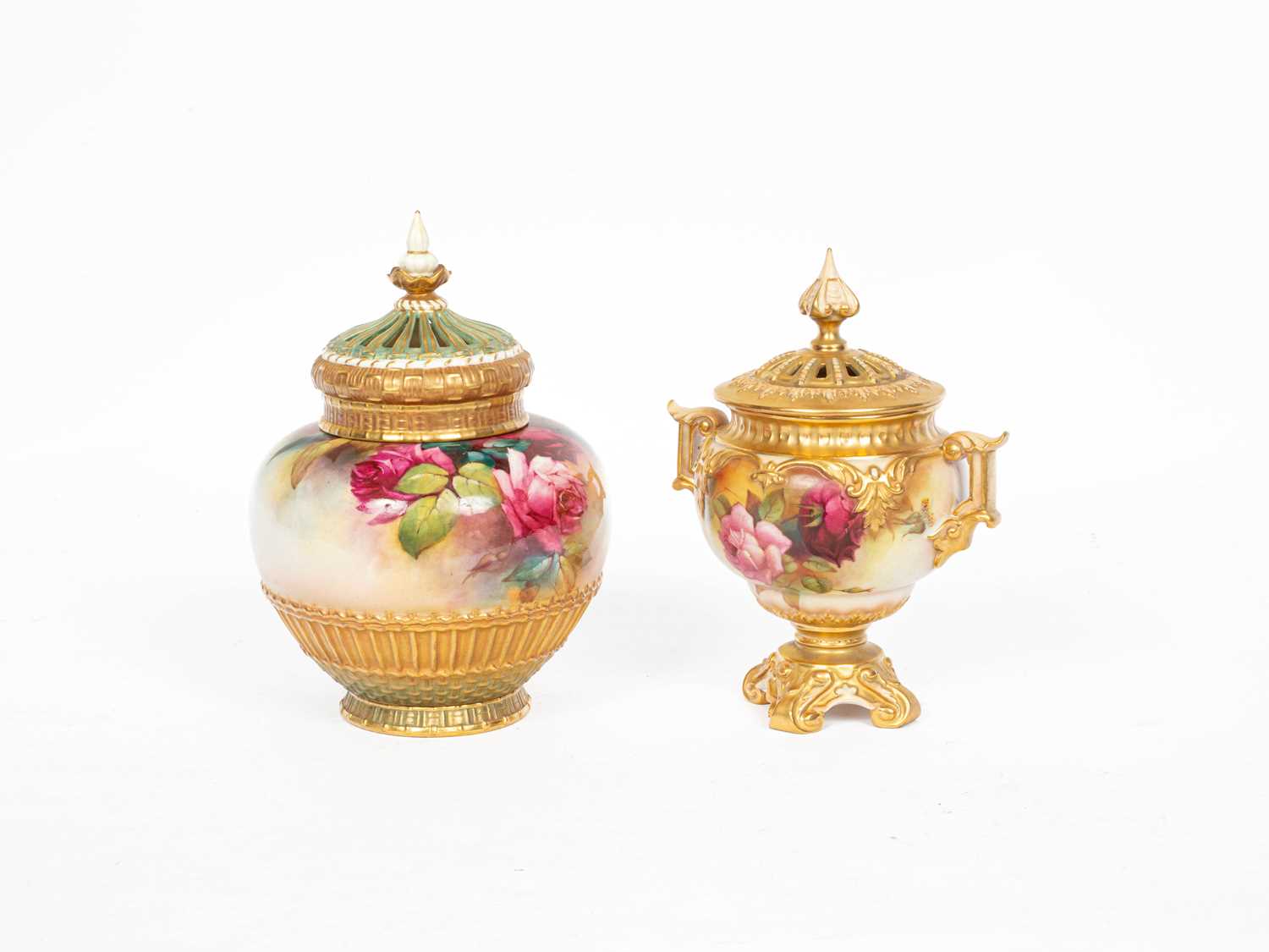 Two Royal Worcester potpourri jars and covers