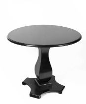 A 20th Century ebonised table