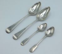 A pair of 1818 George III Exeter silver tablespoons by George Ferris twinned with two William IV Exe