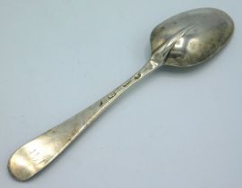 An early 18thC. silver rat tailed tablespoon, probably London, bearing stag mark, other marks rubbed