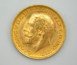 A 1911 George V full gold sovereign, some lustre