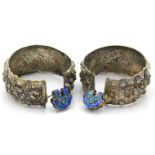 A pair of decorative antique white metal bangles w