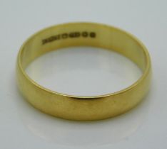 An 18ct gold band, 2.1g, size M/N