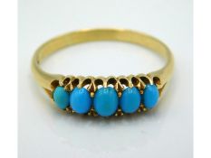 An antique 18ct gold ring set with turquoise, 3.6g