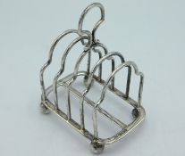 A 1903 Edwardian Birmingham silver toast rack by J
