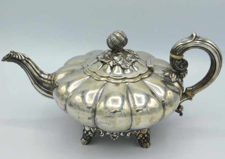 An 1837 William IV London silver teapot of squat & lobed form by Joseph & Albert Savory, 290mm wide,