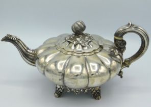 An 1837 William IV London silver teapot of squat & lobed form by Joseph & Albert Savory, 290mm wide,