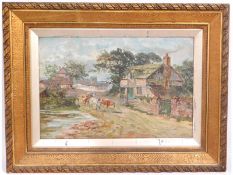 An antique framed oil on canvas depicting cattle o