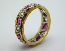 A 9ct gold eternity ring set with diamonds in hear