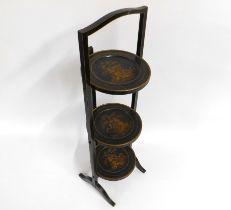 A 1920's Chinese lacquerware cake stand, 855mm tal