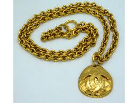 A 1994 Chanel 24ct gold plated pendant necklace wi