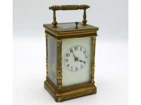 A French brass repeater carriage clock by R & Co.