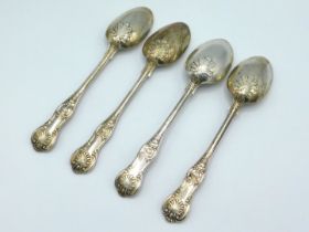 An 1860 set of four early Victorian London silver kings pattern tablespoons by Francis Higgins, worn