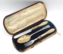 A cased 1868 Victorian Birmingham silver christening set, lacking original spoon, by George Unite wi