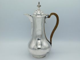 A 1762 George III London silver coffee pot of plai