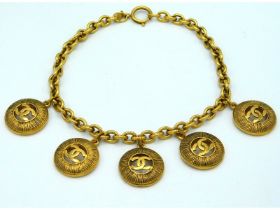 A 1990-1991 Chanel 24ct gold plated five medallion