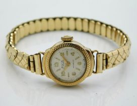 An Avia ladies yellow metal cased watch with gold