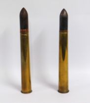 A pair of deactivated WW2 shells, 1939 & 1941 resp