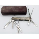 A 1932 Sheffield silver cased multi-tool with case