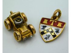 A 9ct gold miniature car charm twinned with a 9ct