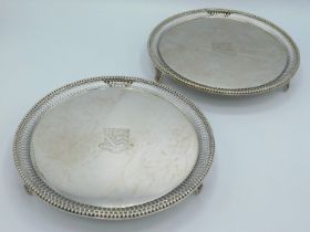 A matching pair of 1801 George III footed silver w