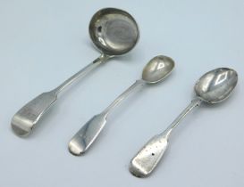 An 1865 Victorian Exeter silver sauce ladle by Tho