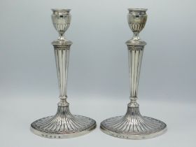A 1781 George III pair of Sheffield silver candles