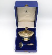 A cased Elizabeth II London silver sugar bowl, cov