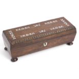 An early 19thC. rosewood glove box with inlaid mot