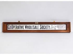 A mahogany mounted advertising sign 'Cooperative W