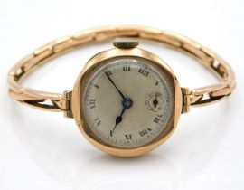 A ladies 9ct gold case & strap wristwatch, not running, 16.4g, case 23mm diameter