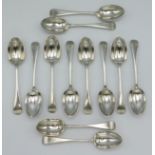 A set of twelve, 1904 Edwardian London silver dessert spoons by Francis Higgins III, monogrammed, 17