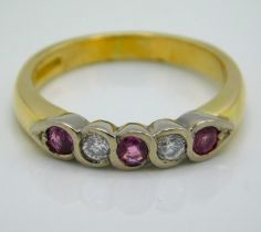 An 18ct gold pave set diamond & ruby ring with approx. 0.15ct of diamond, 4.9g, size N