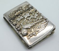 An antique Chinese silver cigarette case with deta