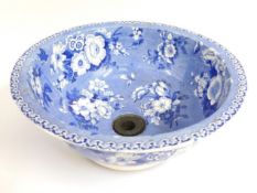 A 19thC. blue & white transferware wash basin, 310