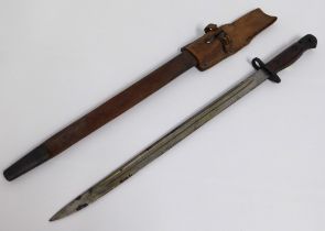 An early 20thC. bayonet with scabbard & leather be