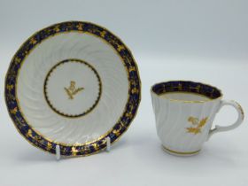 An 18thC. Worcester porcelain fluted cup & saucer