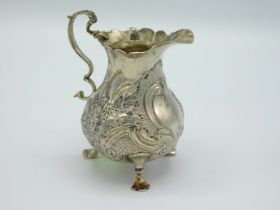 A 1761 George III London silver creamer by John Mu