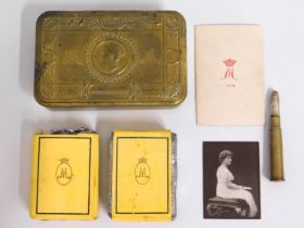 An officers WW1 Queen Mary Christmas box with contents including a silver tipped bullet pencil