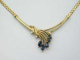 A 9ct gold necklace set with three small round dia