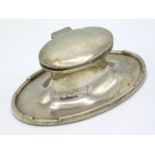 A 1915 Birmingham silver inkwell by Asprey & Co. bump to rim, lacking liner, 163mm wide x 76mm deep