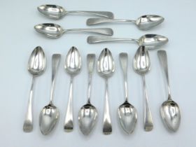 An 1804 set of twelve, George III London silver dessert spoons by George Wintle, monogrammed, 166mm