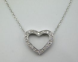 An 18ct white gold necklace & heart shaped pendant
