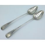 A pair of 1810 George III Exeter silver basting spoons by Richard Ferris, both initialled, 295mm lon