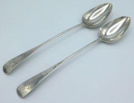A pair of 1810 George III Exeter silver basting spoons by Richard Ferris, both initialled, 295mm lon